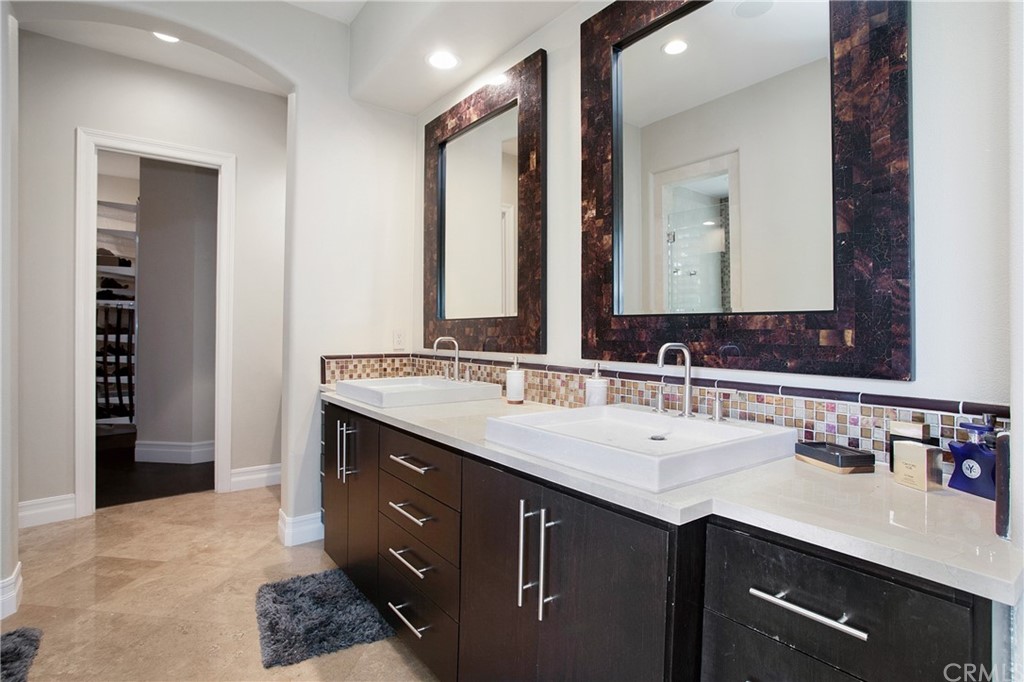 2395 Horizon Way Tustin, CA 92782 - Photo 17 of 39 a bathroom with a sink double vanity and a mirror