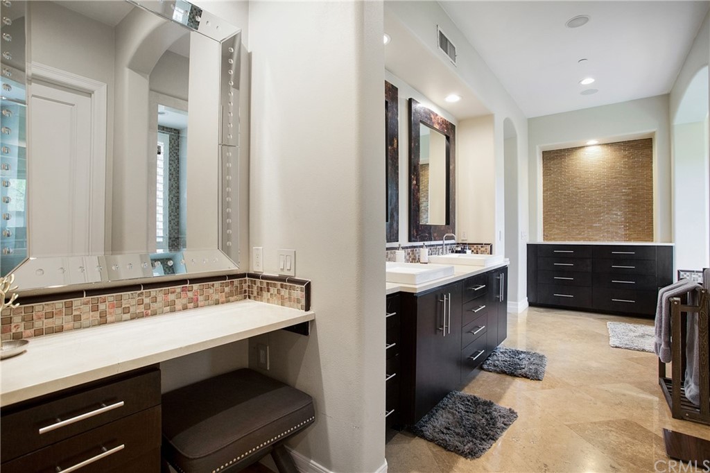 2395 Horizon Way Tustin, CA 92782 - Photo 18 of 39 a bathroom with a sink double vanity and a mirror