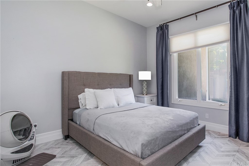 2395 Horizon Way Tustin, CA 92782 - Photo 24 of 39 a bedroom with a bed and a window
