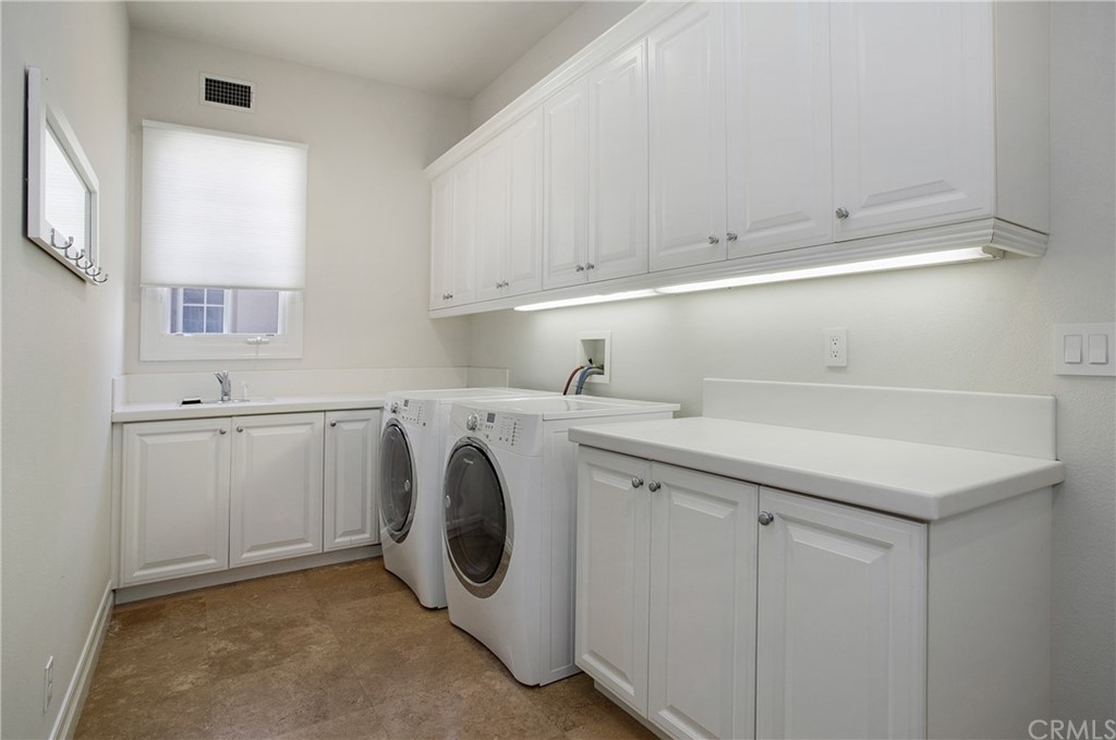 2395 Horizon Way Tustin, CA 92782 - Photo 26 of 39 a utility room with sink dryer and washer
