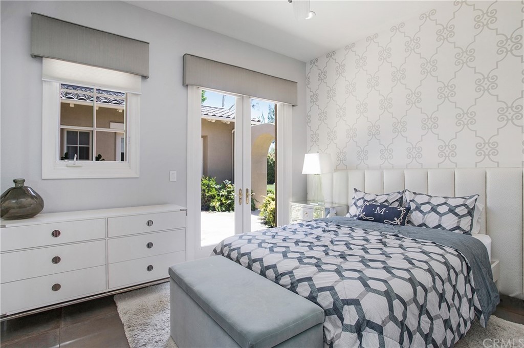 2395 Horizon Way Tustin, CA 92782 - Photo 27 of 39 a bedroom with a bed and a window