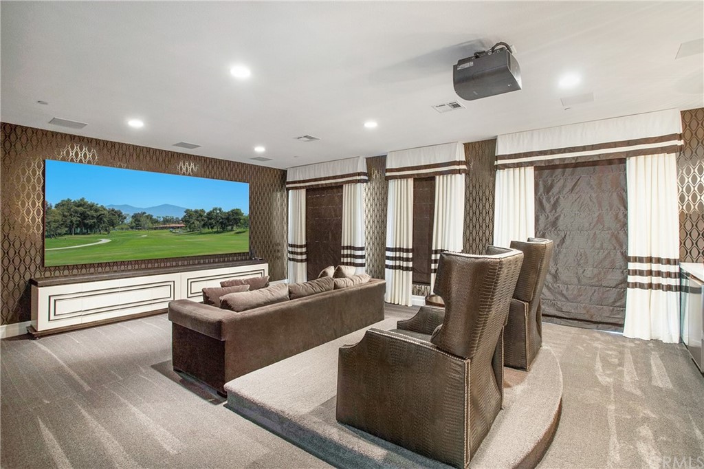 2395 Horizon Way Tustin, CA 92782 - Photo 29 of 39 a living room with furniture and a flat screen tv