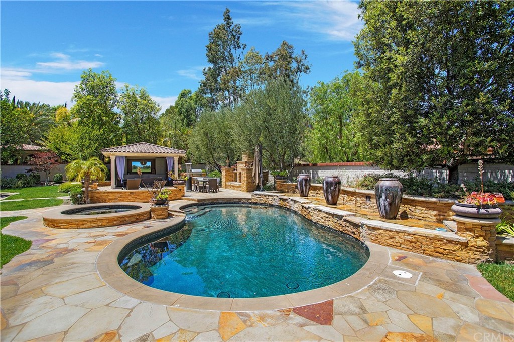 2395 Horizon Way Tustin, CA 92782 - Photo 35 of 39 a view of a swimming pool with a patio