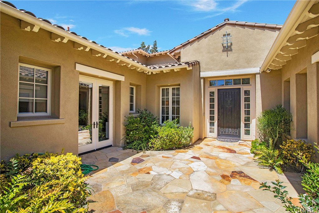 2395 Horizon Way Tustin, CA 92782 - Photo 4 of 39 a view of a house with potted plants