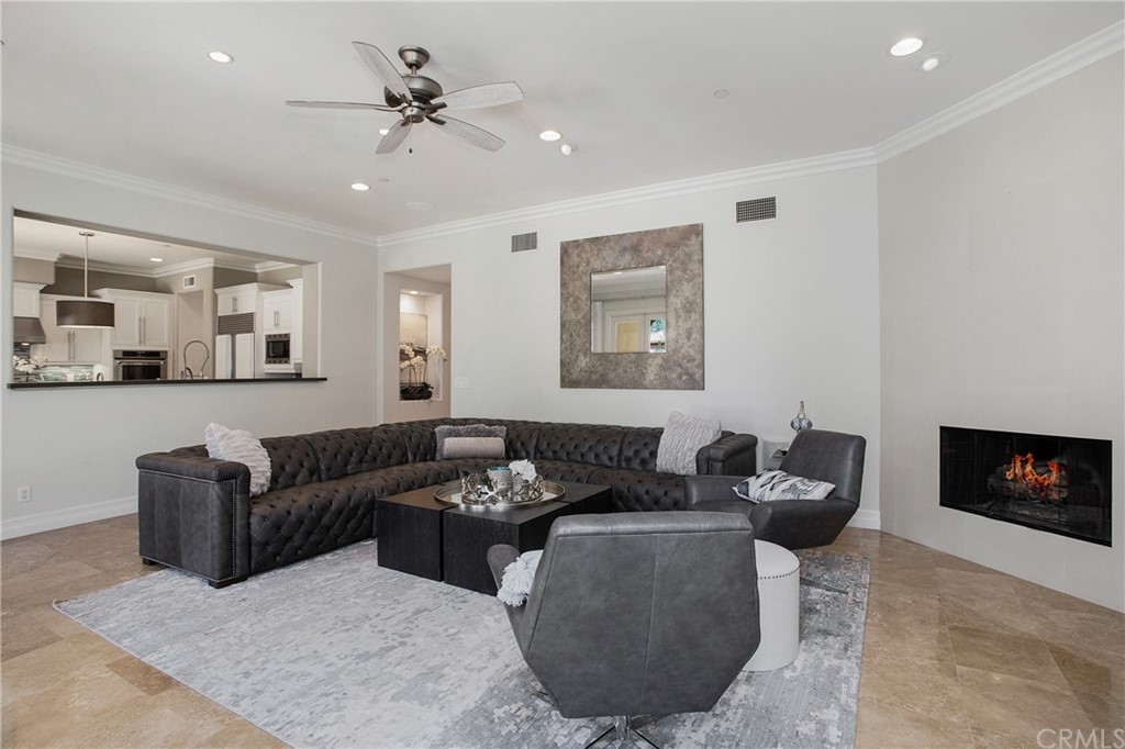 2395 Horizon Way Tustin, CA 92782 - Photo 9 of 39 a living room with furniture and a fireplace