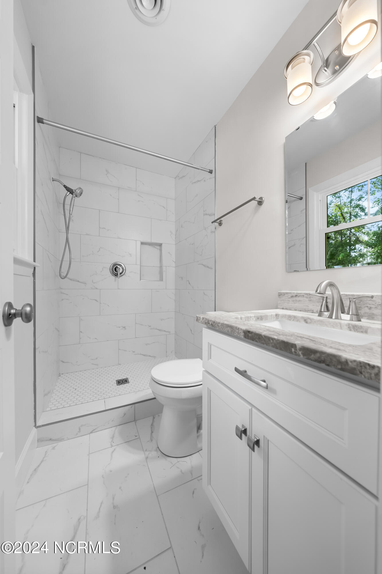 303 Kelly Road Wilmington, NC 28409 - Photo 13 of 29 NEW master bath. Walk in shower