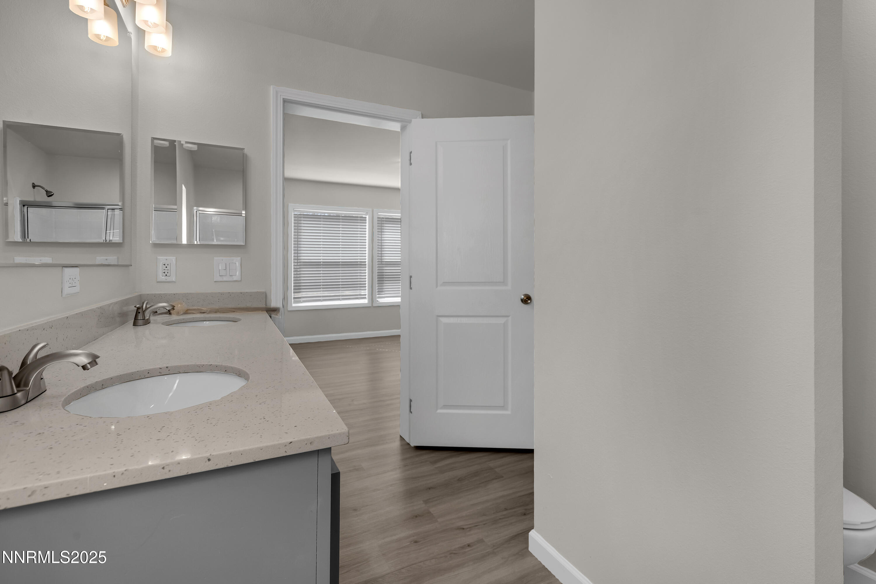 3810 Bobolink Circle Reno, NV 89508 - Photo 18 of 36 a bathroom with a sink and a mirror