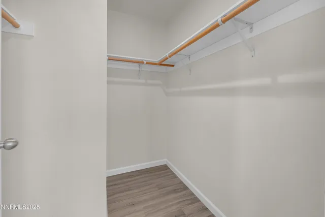 a view of an empty walk in closet