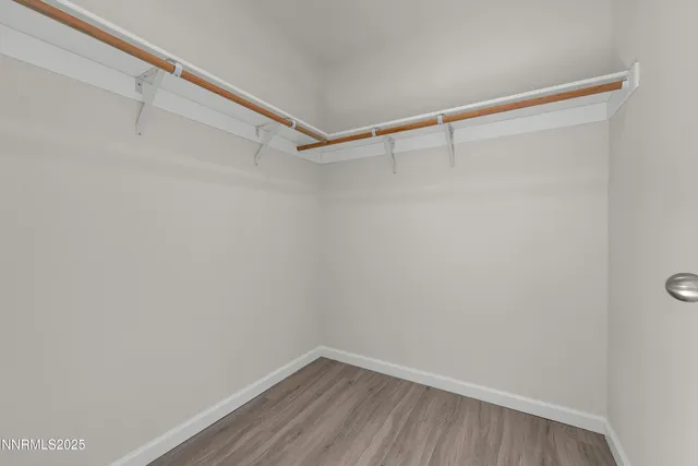 a view of an empty walk in closet