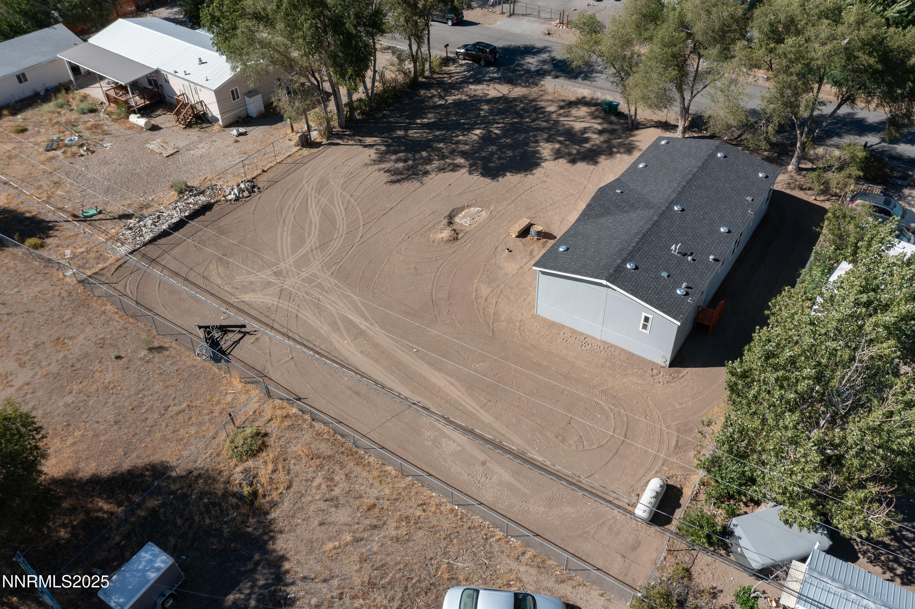 3810 Bobolink Circle Reno, NV 89508 - Photo 31 of 36 an aerial view of a house with a yard