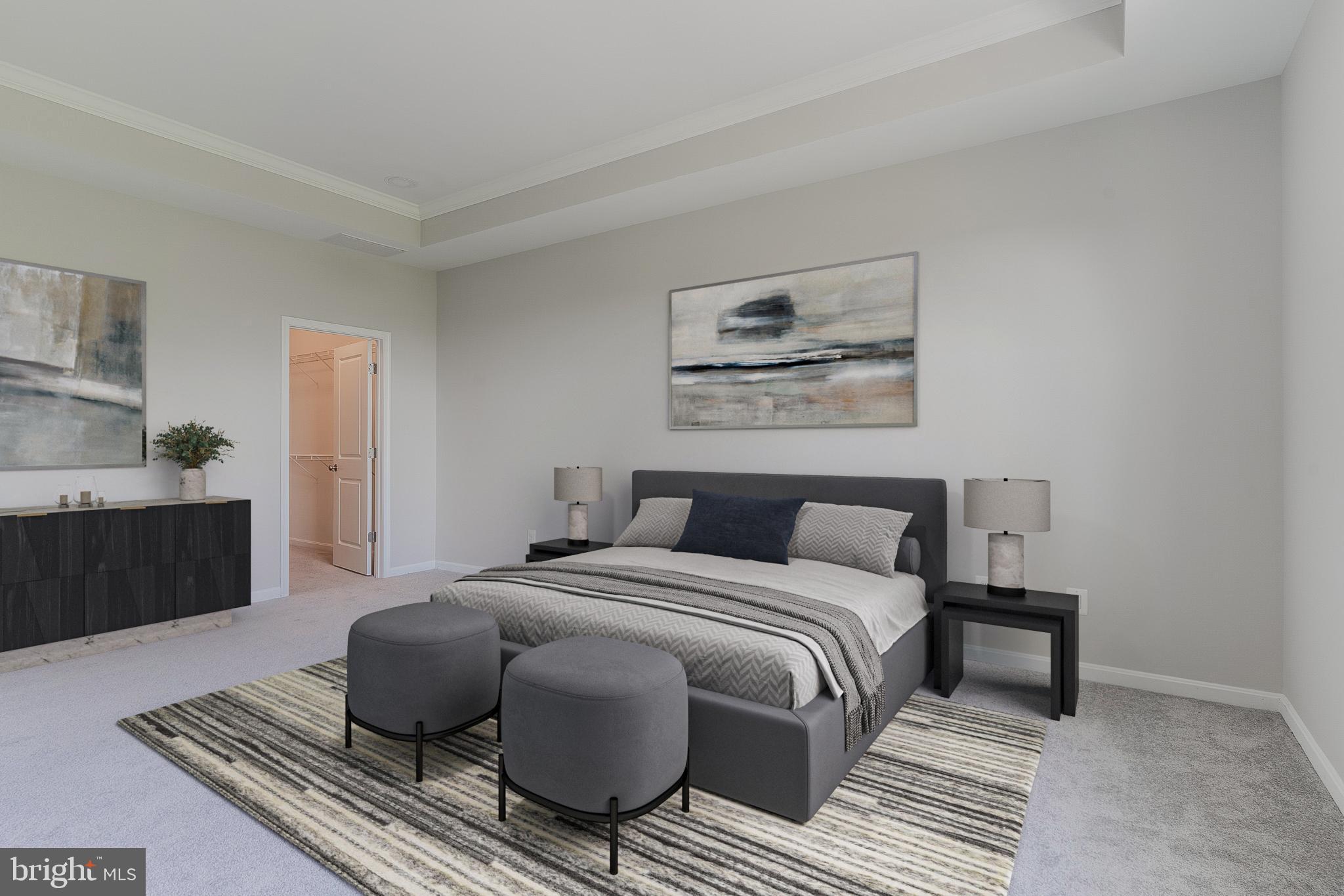 23480 Epperson Square Brambleton, VA 20148 - Photo 32 of 50 a bedroom with a bed and wooden floor