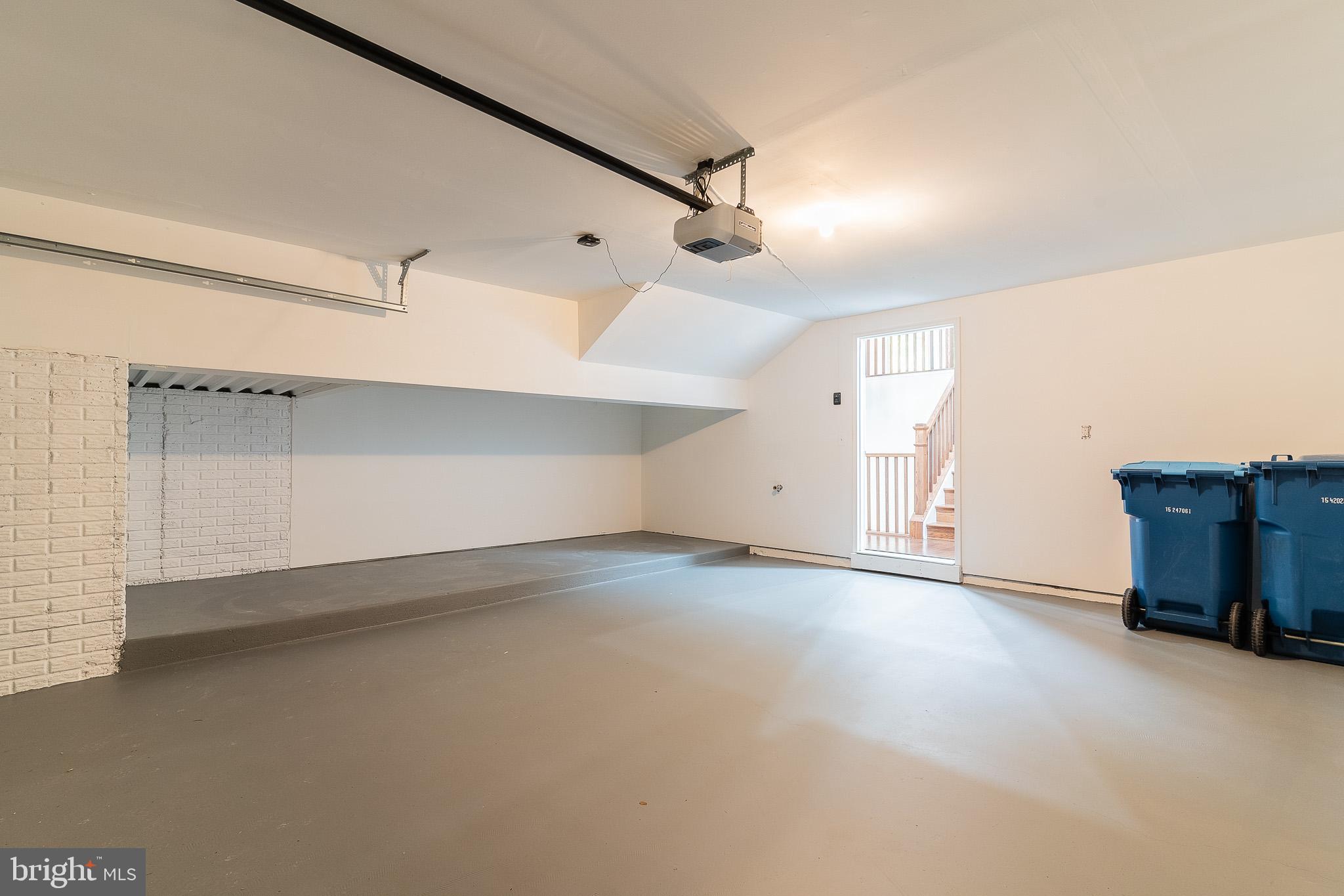 23480 Epperson Square Brambleton, VA 20148 - Photo 44 of 50 an empty room with a empty space and windows