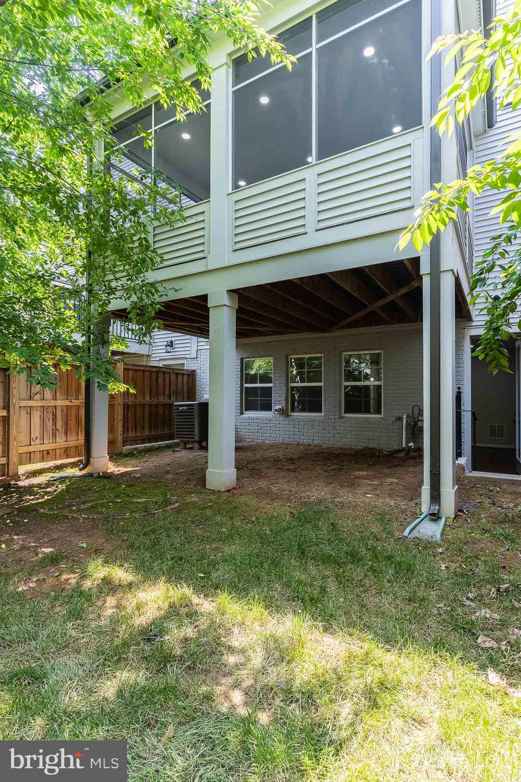 23480 Epperson Square Brambleton, VA 20148 - Photo 46 of 50 a front view of a house with a garden