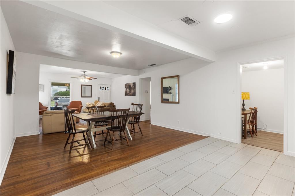 3554 Winston Road Fort Worth, TX 76109 - Photo 12 of 25 a view of a dining room with furniture and wooden floor