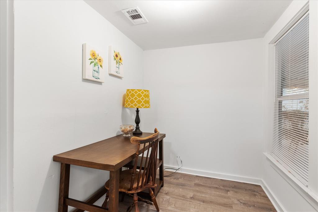 3554 Winston Road Fort Worth, TX 76109 - Photo 15 of 25 a view of a workspace with furniture and wooden floor