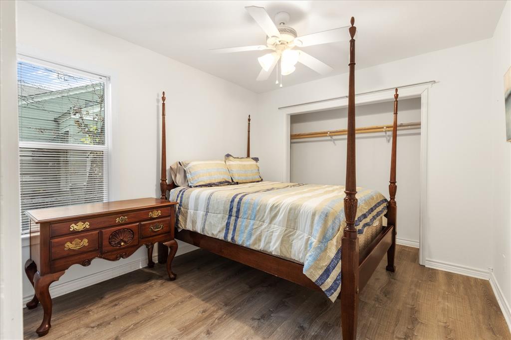 3554 Winston Road Fort Worth, TX 76109 - Photo 22 of 25 a bedroom with a bed a chandelier and a window