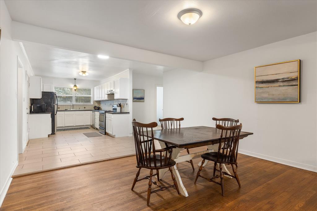 3554 Winston Road Fort Worth, TX 76109 - Photo 5 of 25 a view of a dining room with furniture and wooden floor