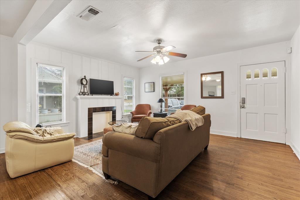 3554 Winston Road Fort Worth, TX 76109 - Photo 10 of 25 a living room with furniture fireplace and a window