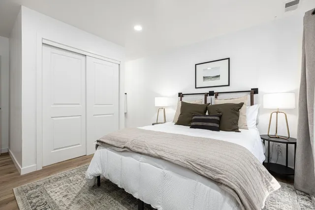 a bathroom with a shower a toilet and a shower