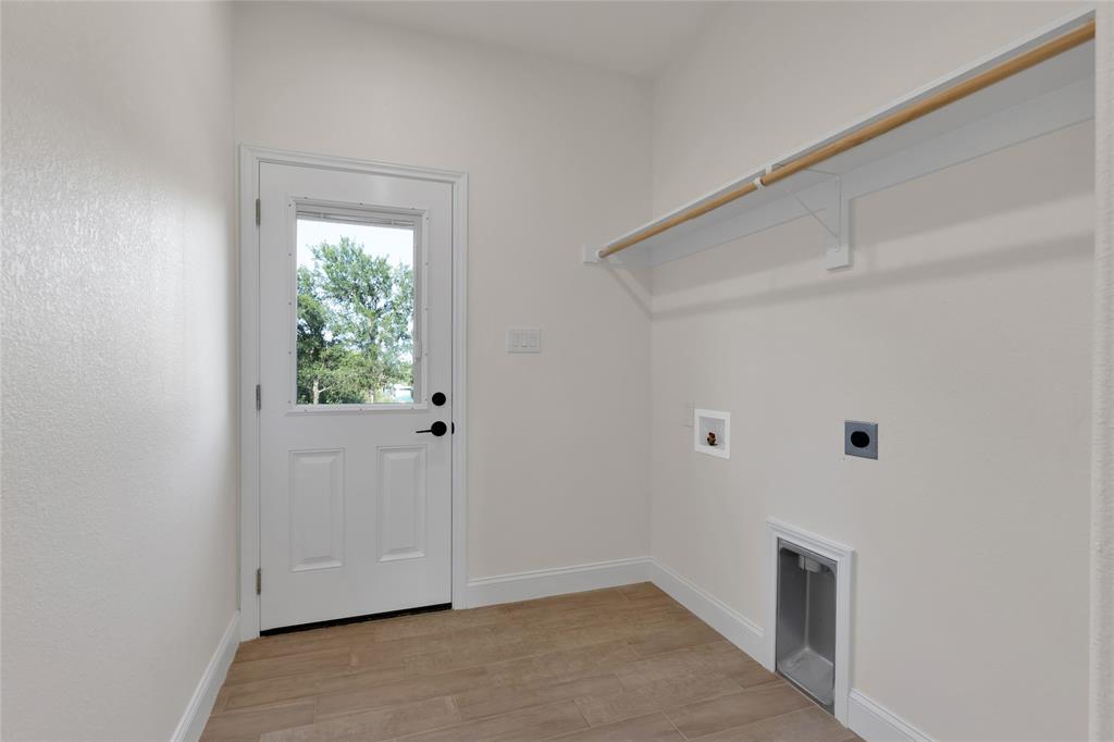 815 Southwest 28th Street Mineral Wells, TX 76067 - Photo 21 of 40 a view of an empty room with a window