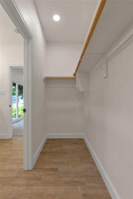 815 Southwest 28th Street Mineral Wells, TX 76067 - Photo 26 of 40 a view of a hallway with wooden floor and entryway