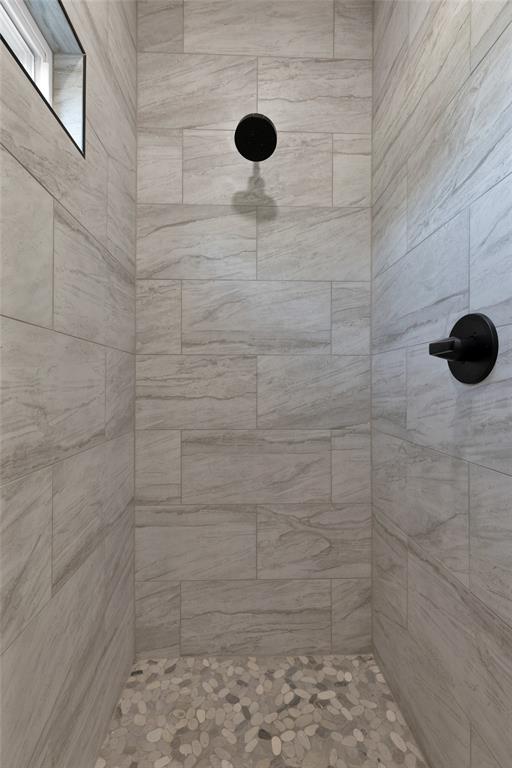 815 Southwest 28th Street Mineral Wells, TX 76067 - Photo 28 of 40 a bathroom with a shower