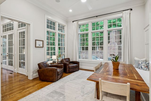 a bathroom with a shower a toilet and a sink
