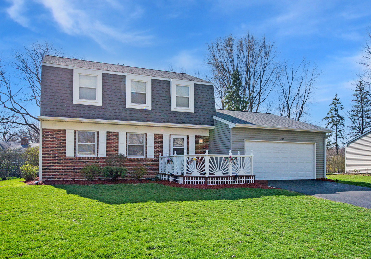 230 Ridgefield Lane Naperville, IL 60565 - Photo 2 of 26 a front view of house with yard and outdoor seating