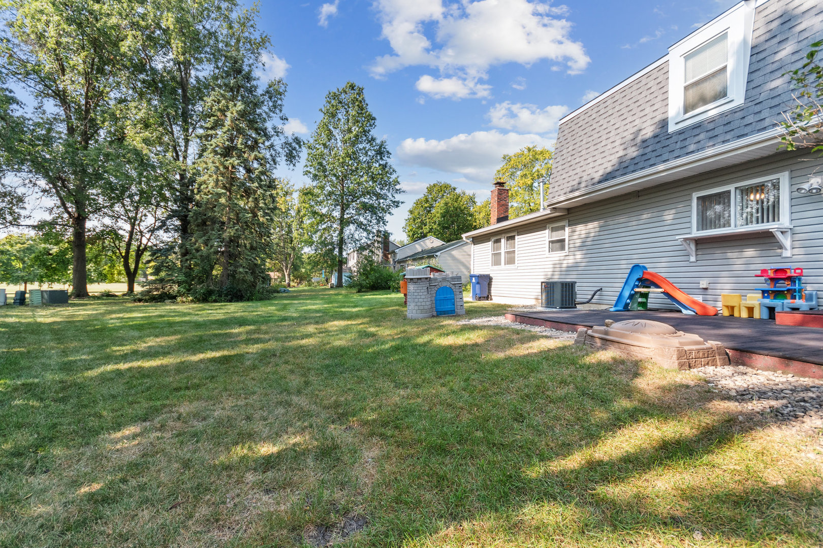 230 Ridgefield Lane Naperville, IL 60565 - Photo 22 of 26 a view of a house with a back yard