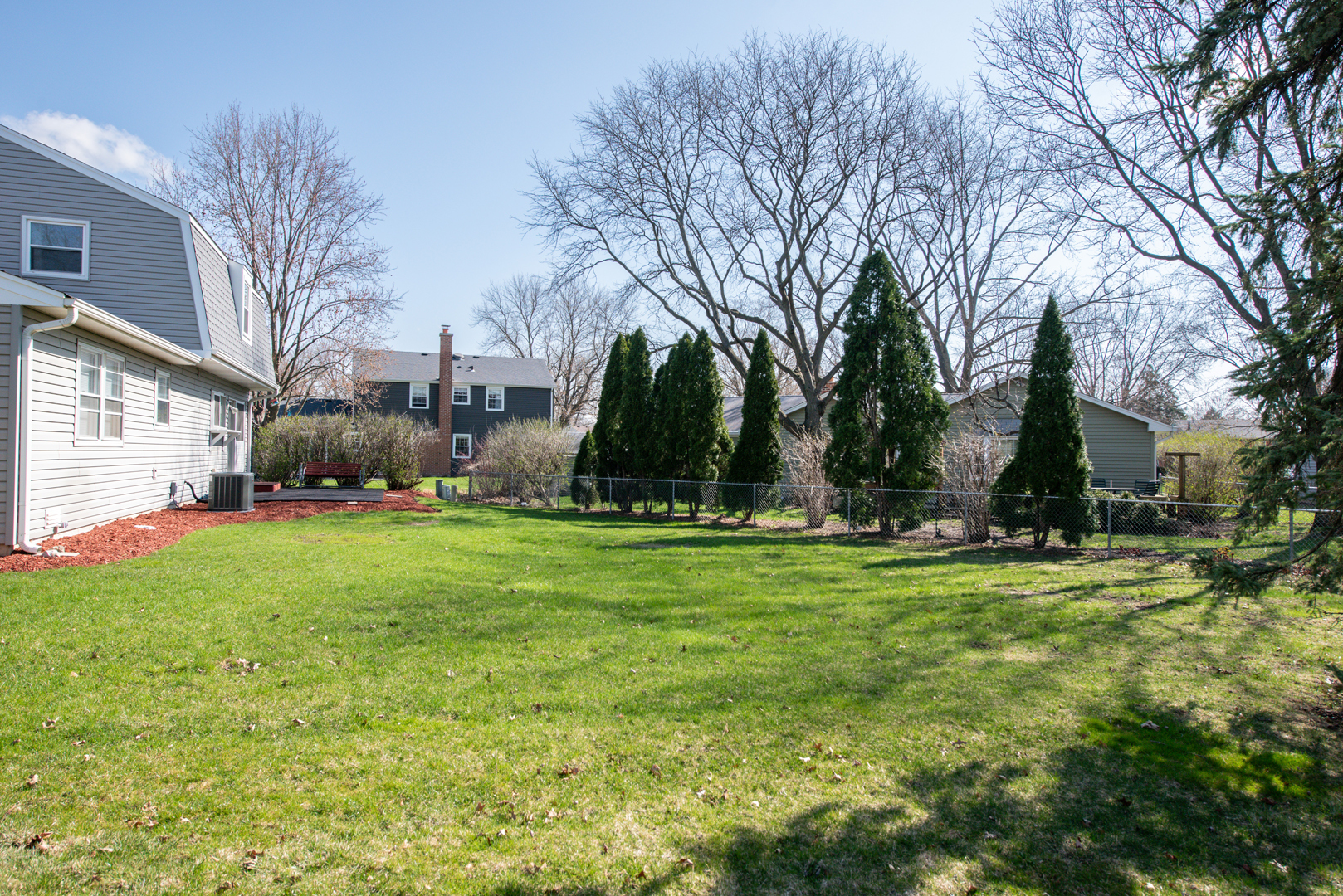 230 Ridgefield Lane Naperville, IL 60565 - Photo 23 of 26 a view of a field of grass and trees