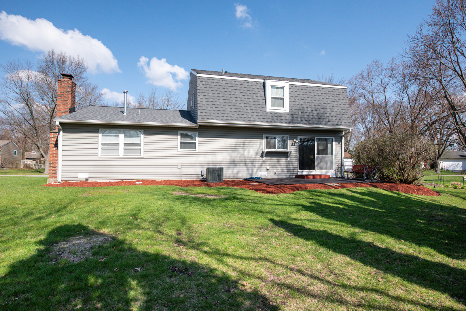 230 Ridgefield Lane Naperville, IL 60565 - Photo 25 of 26 a front view of house with yard and outdoor seating