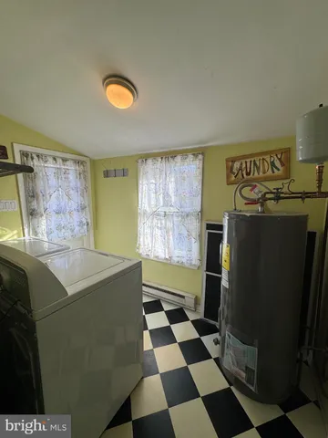 a house with trees in the background