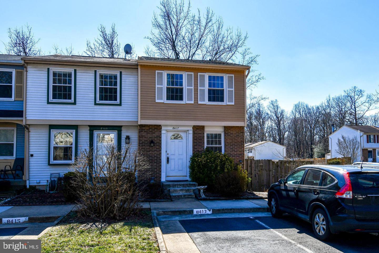 a view of car parked in front of house