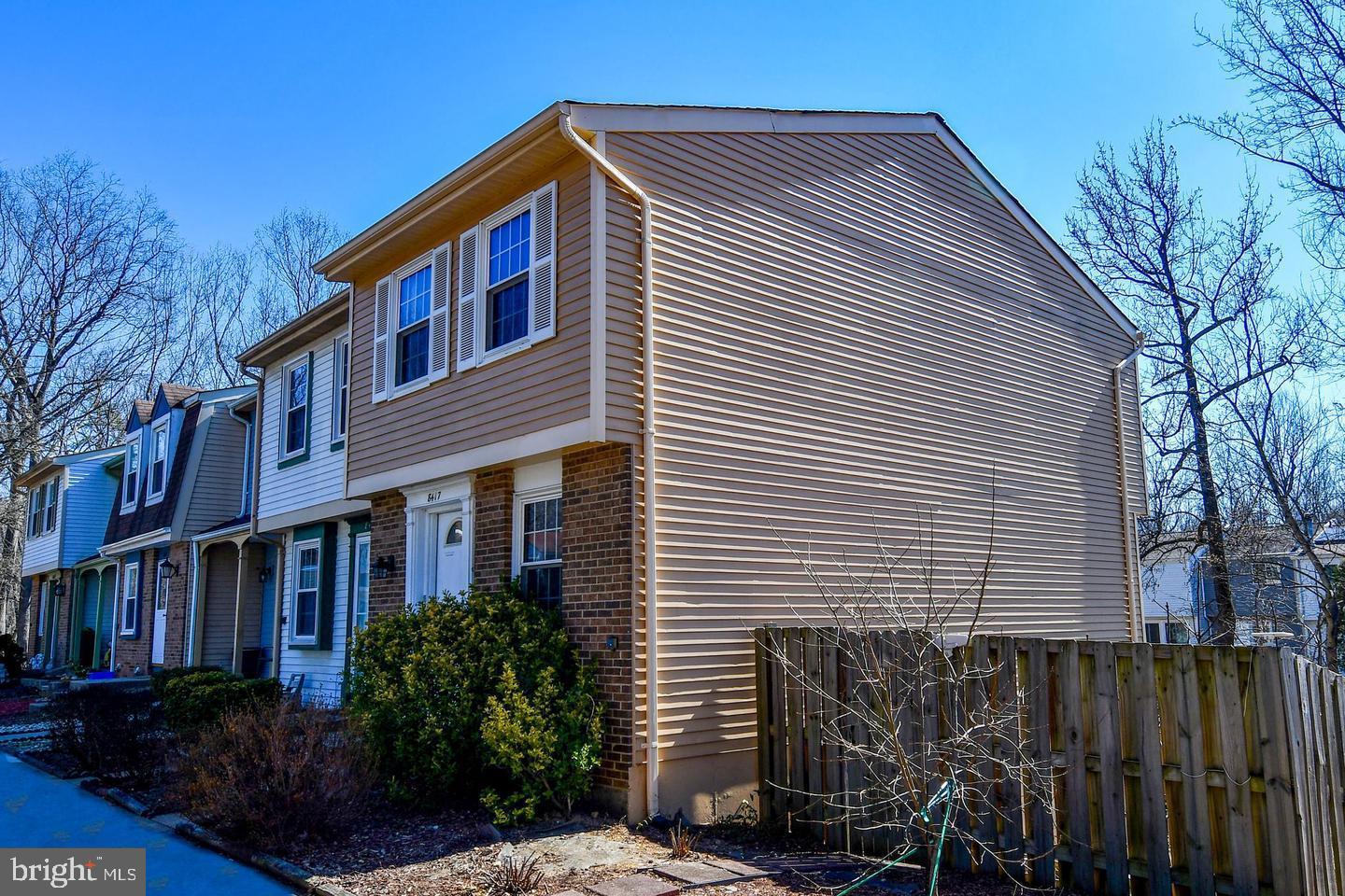 8417 Cedar Falls Court Springfield, VA 22153 - Photo 2 of 34 a front view of a house with a yard