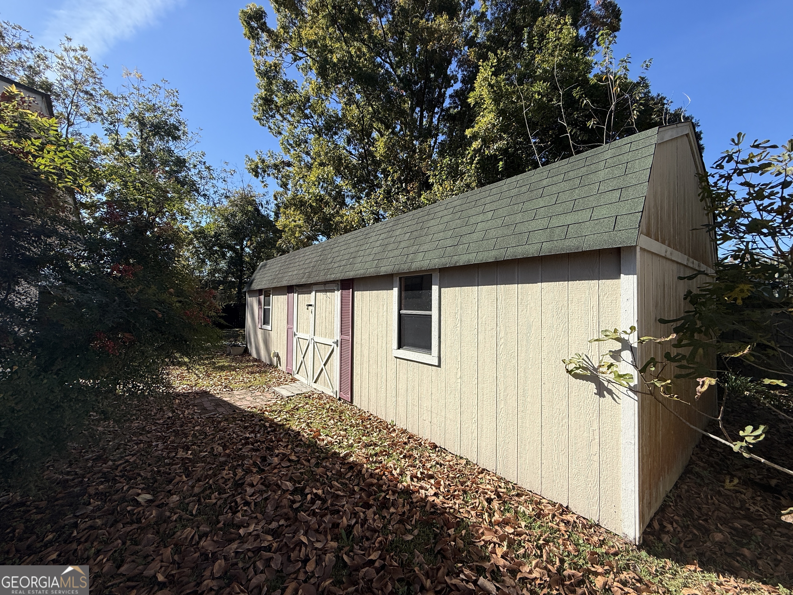 219 North College Street Pembroke, GA 31321 - Photo 21 of 24 a backyard of a house with lots of green space