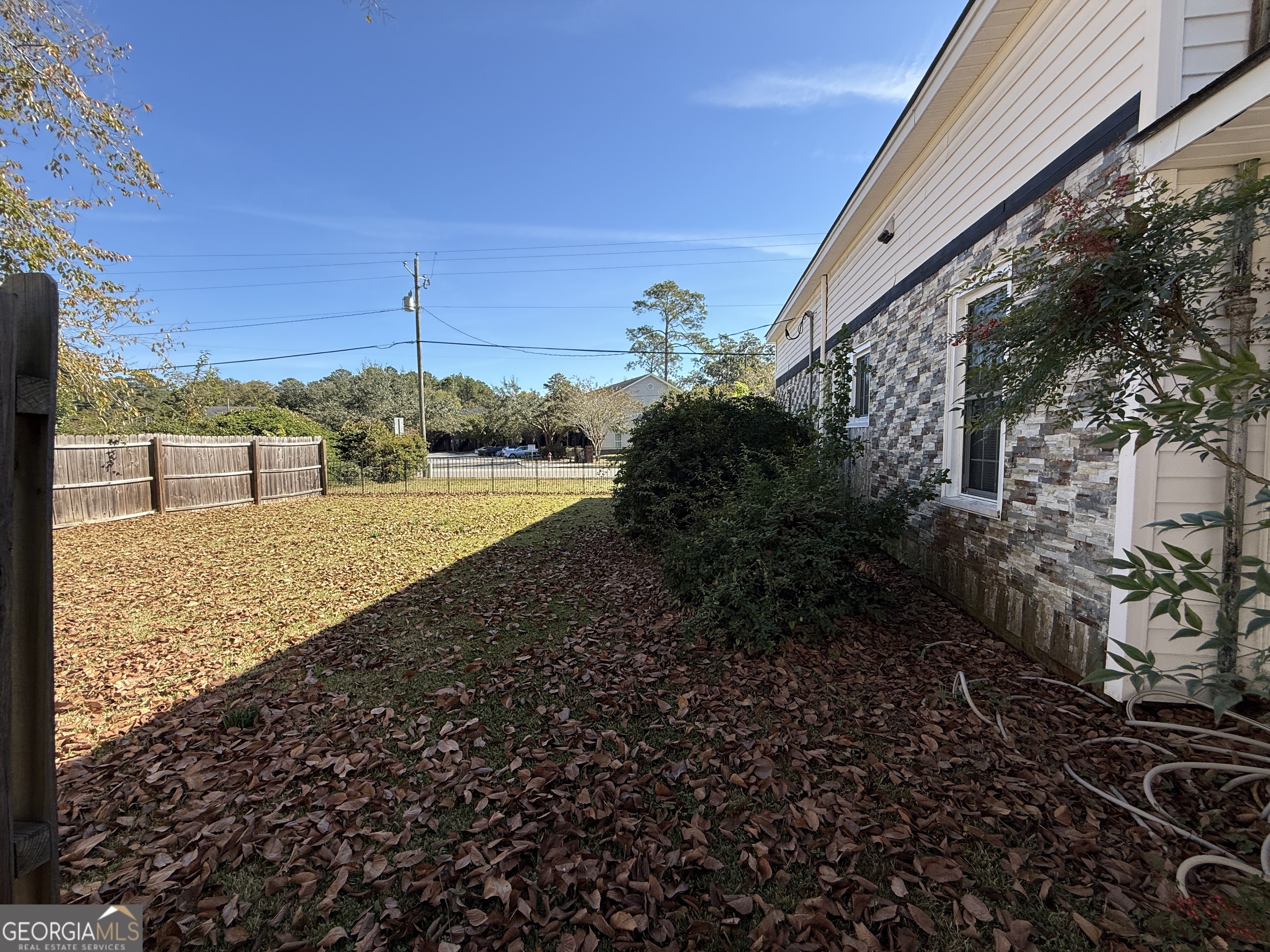 219 North College Street Pembroke, GA 31321 - Photo 22 of 24 a view of a yard with an outdoor space