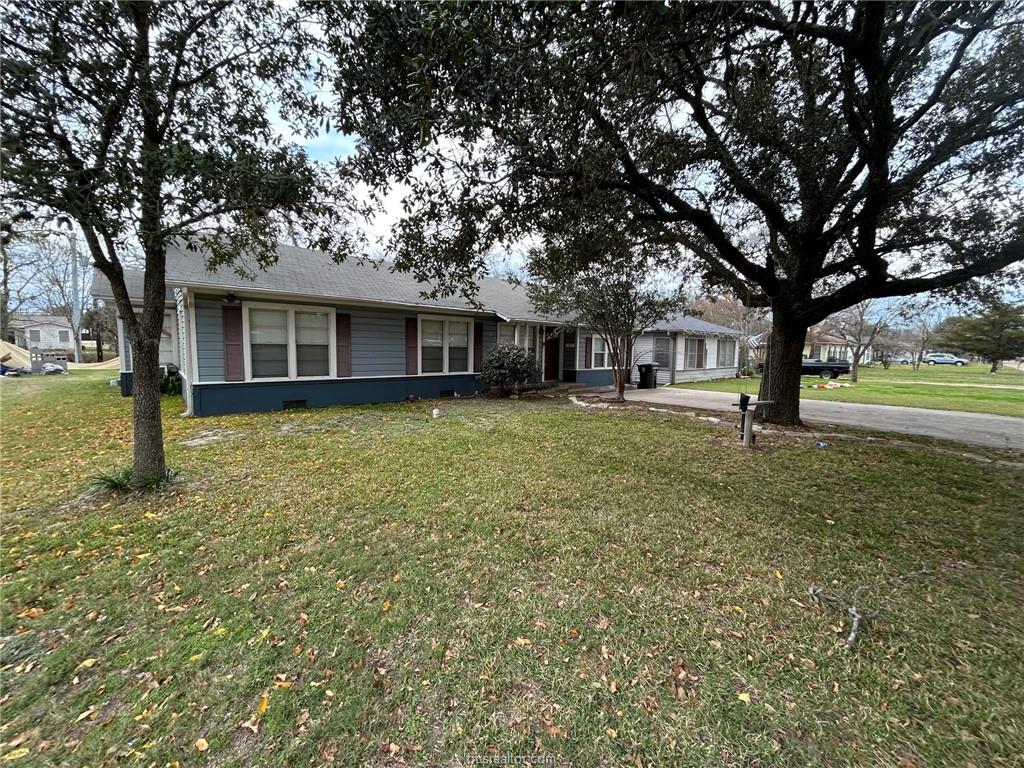 710 Enfield Street Bryan, TX 77802 - Photo 2 of 19 front view of a house with a yard