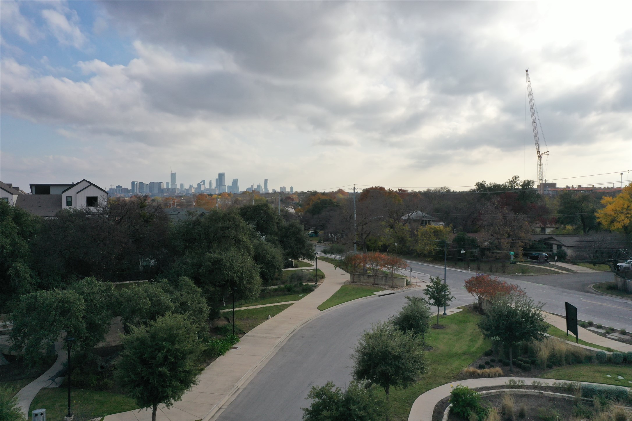 4205 Prevail Lane Austin, TX 78731 - Photo 10 of 14 a view of a city street with lots of green space