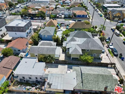 an aerial view of a house with a garden