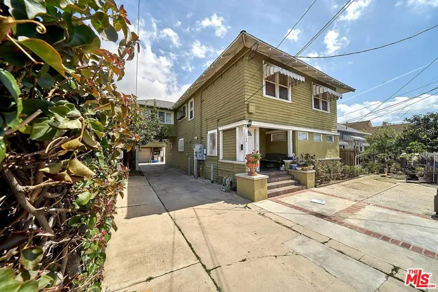 a front view of a house with a garage