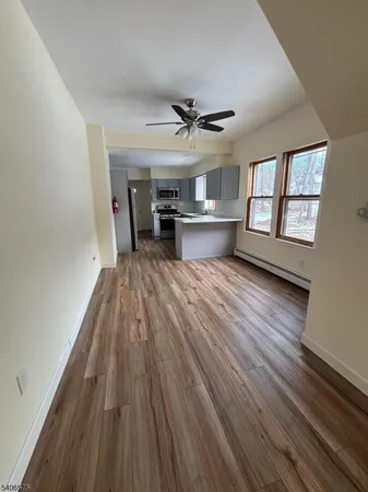 wooden floor in kitchen with window and wooden floor