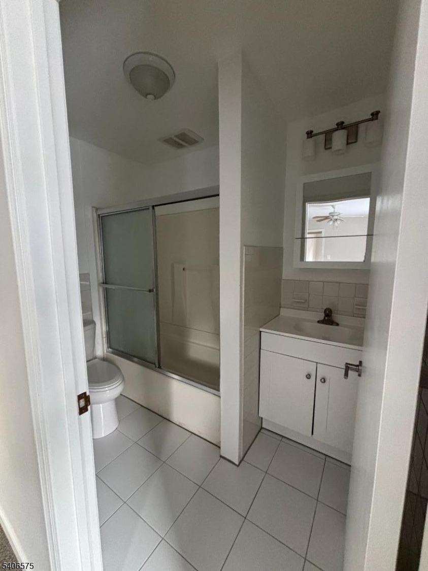 225 East Northfield Road Livingston, NJ 07039 - Photo 10 of 11 a bathroom with a shower and a sink