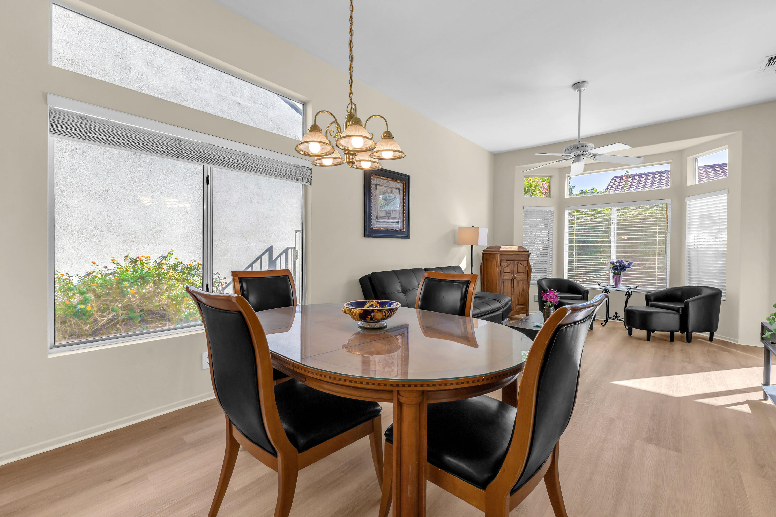 37468 Westridge Avenue Palm Desert, CA 92211 - Photo 13 of 40 a view of a dining room with furniture window and outside view