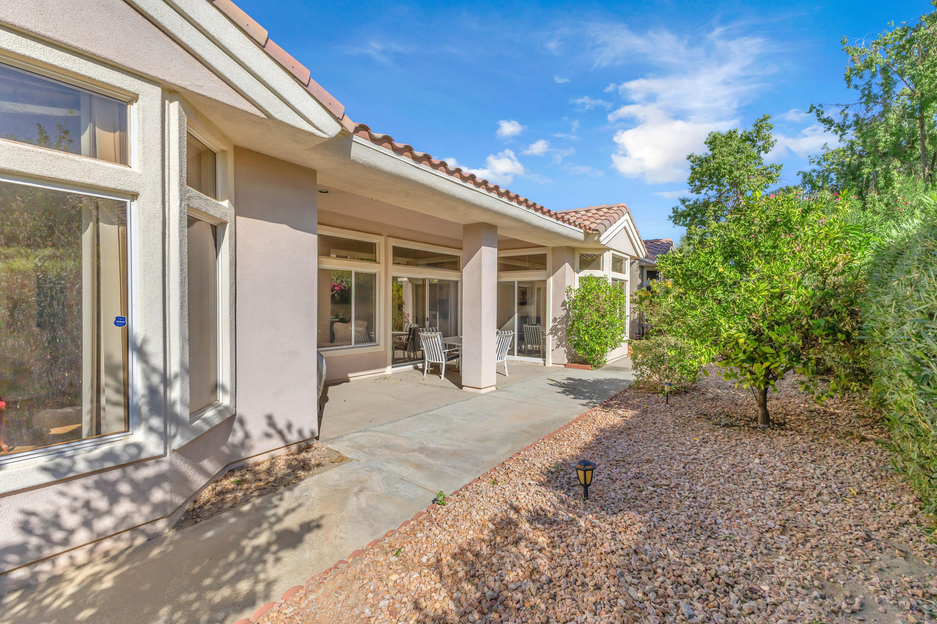 37468 Westridge Avenue Palm Desert, CA 92211 - Photo 33 of 40 a view of a house with backyard porch and sitting area