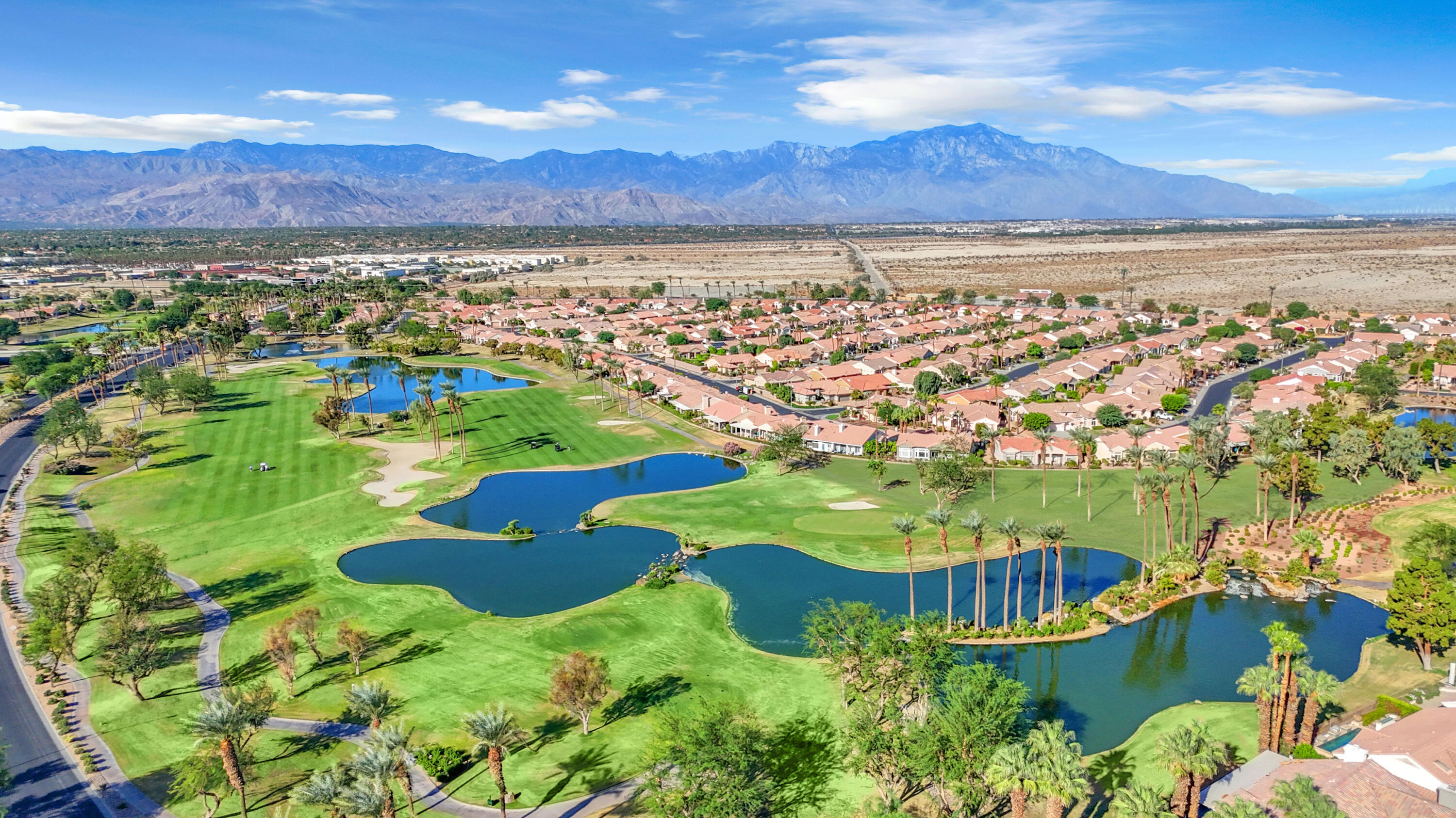 37468 Westridge Avenue Palm Desert, CA 92211 - Photo 36 of 40 an aerial view of residential houses with outdoor space and river