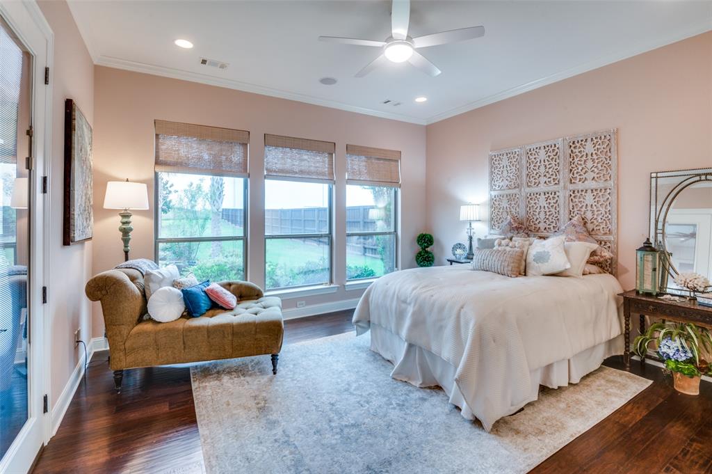 1404 Cumberland Drive Corsicana, TX 75110 - Photo 20 of 40 a spacious bedroom with a bed and large windows