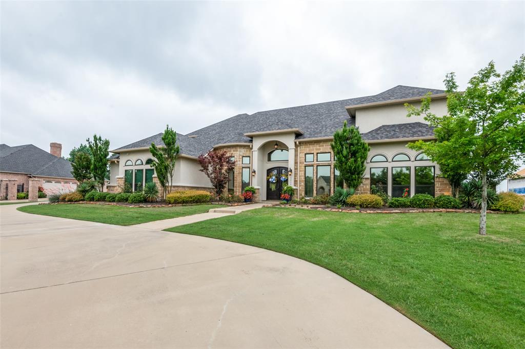 1404 Cumberland Drive Corsicana, TX 75110 - Photo 2 of 40 a front view of house with yard and green space