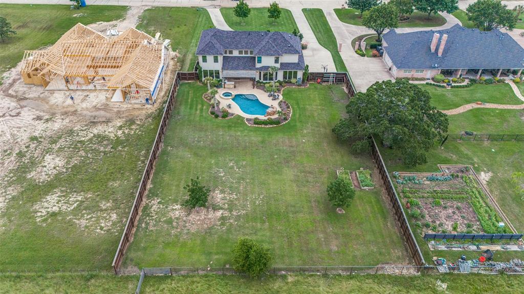 1404 Cumberland Drive Corsicana, TX 75110 - Photo 40 of 40 swimming pool view with a garden