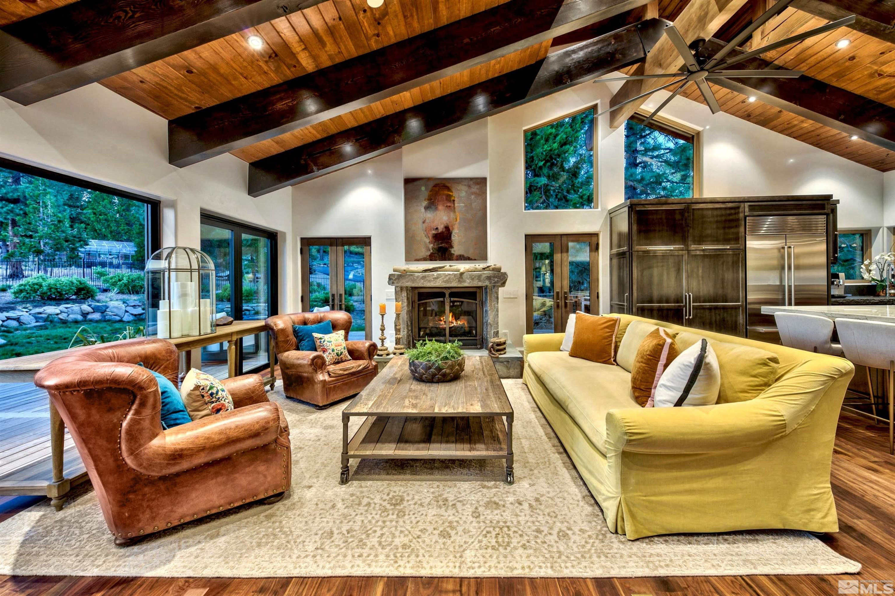 340 Ute Way Stateline, NV 89449 - Photo 13 of 40 a view of patio with couches chairs and a fire pit