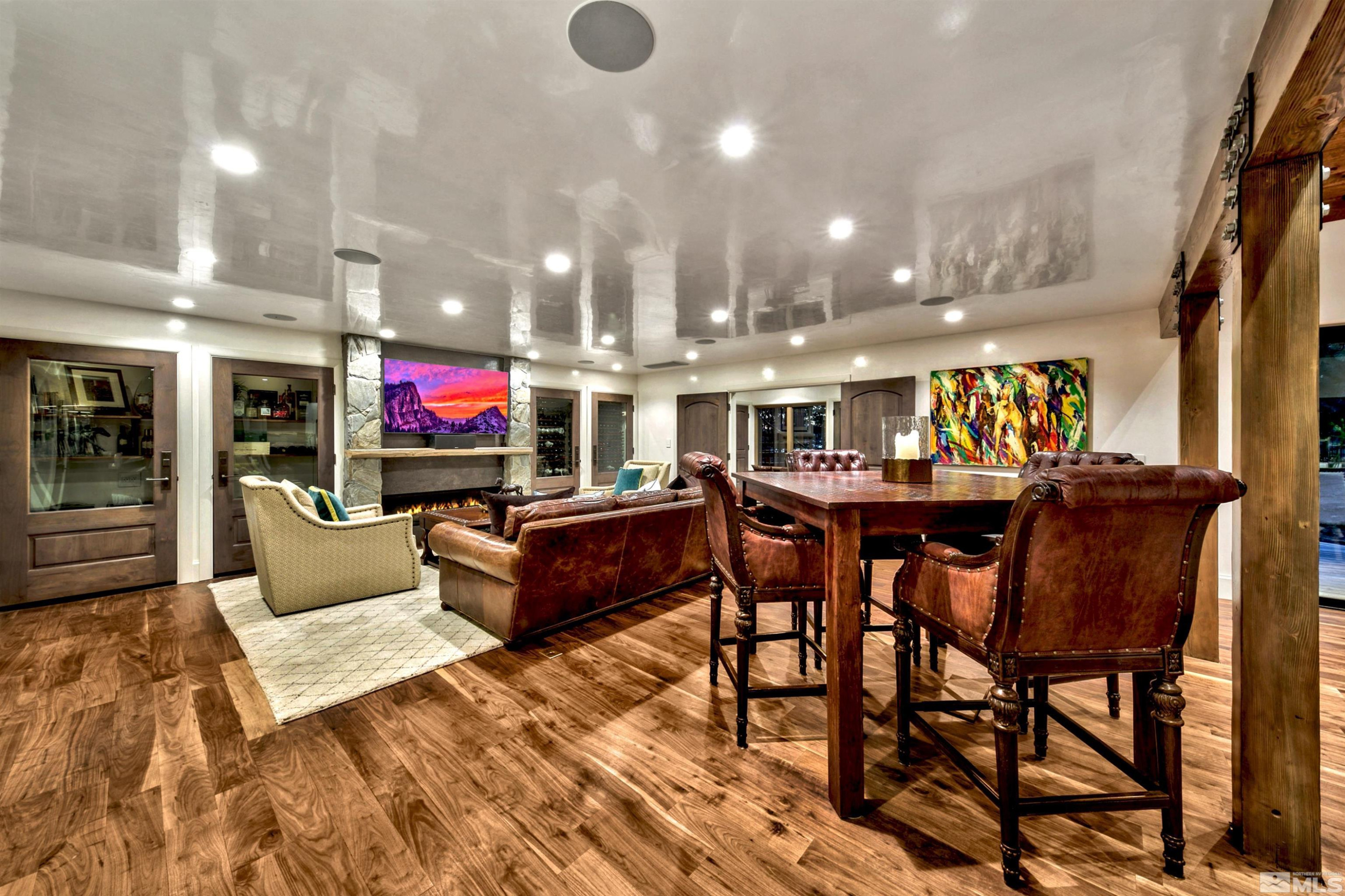 340 Ute Way Stateline, NV 89449 - Photo 23 of 40 a living room with furniture a flat screen tv and kitchen view